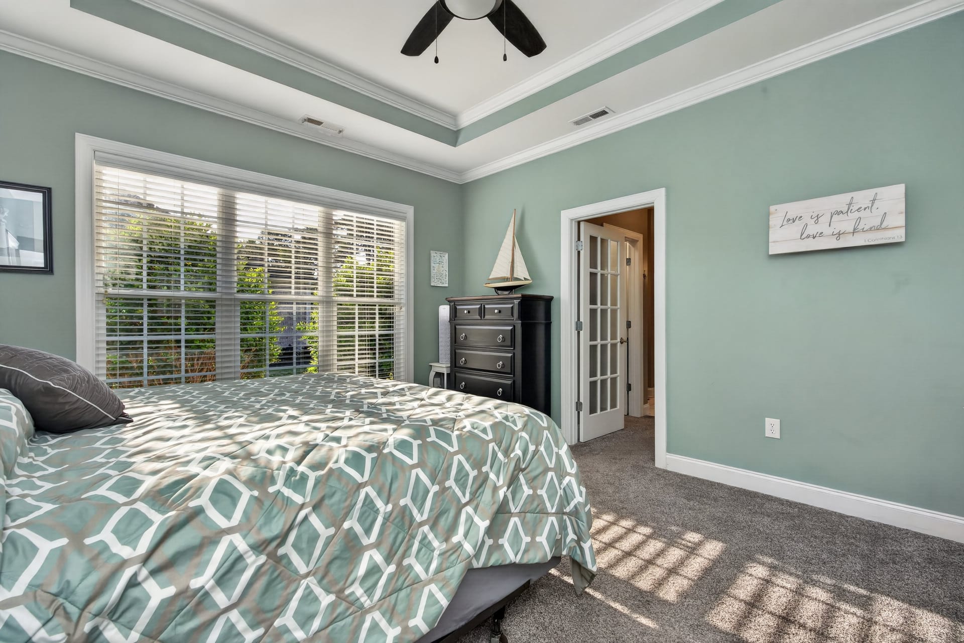 Master bedroom with tray ceiling