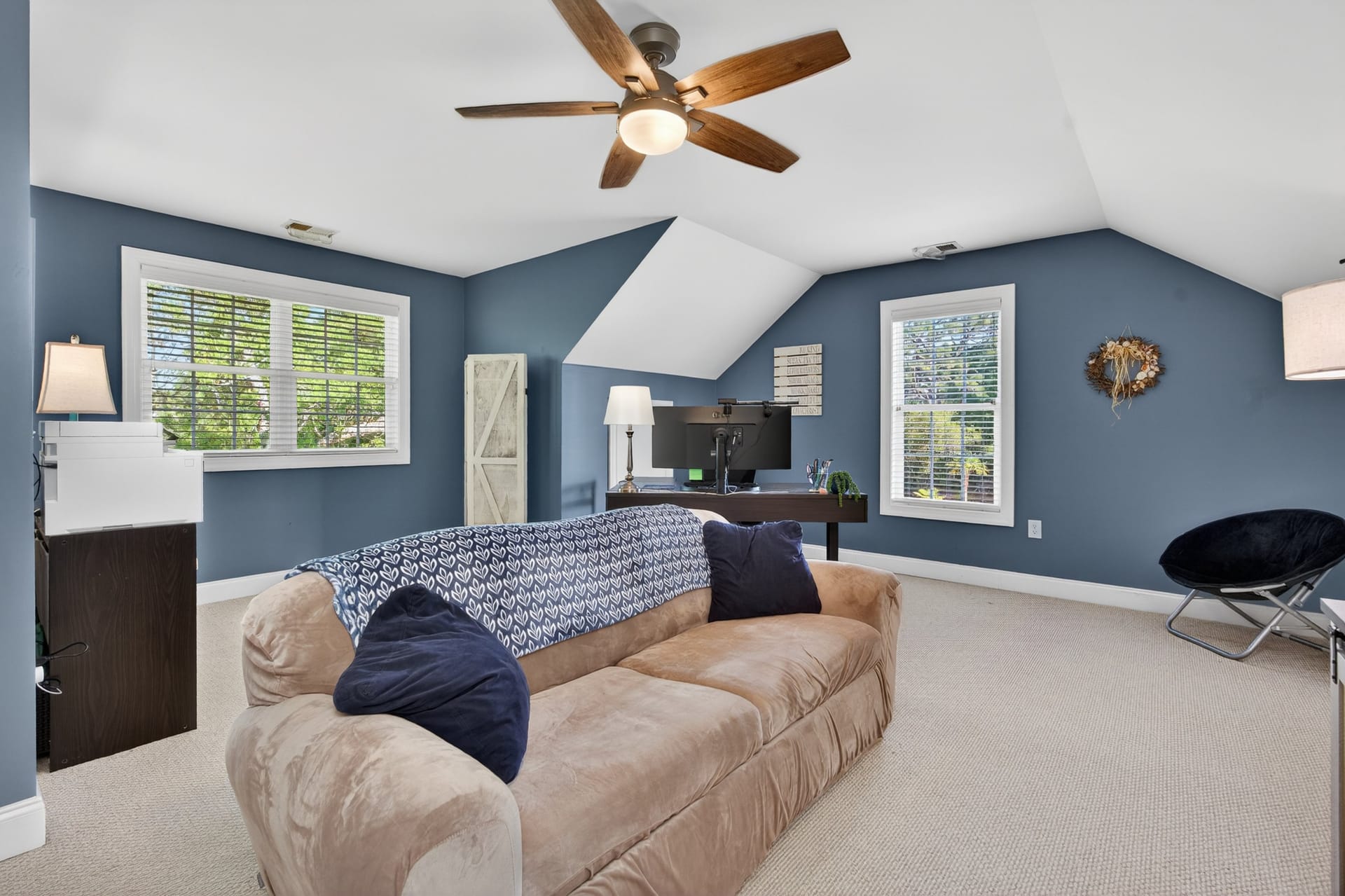 Second floor FROG with blue walls and sofa